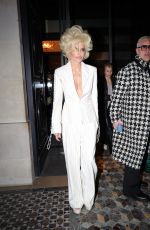 LISA RINNA in a Blonde Wig Arrives at Costes in Paris 01/29/2025