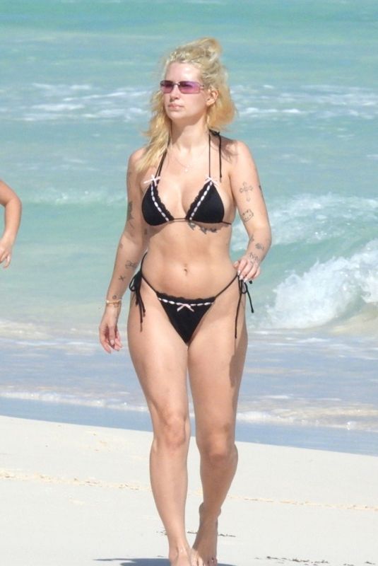 LOTTIE MOSS in Bikini at a Beach in Tulum 01/05/2025