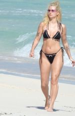 LOTTIE MOSS in Bikini at a Beach in Tulum 01/05/2025