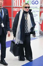 MADONNA and Akeem Morris Arrives at JFK Airport in New York City 01/07/2025