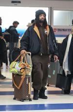 MADONNA and Akeem Morris Arrives at JFK Airport in New York City 01/07/2025