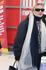 MADONNA and Akeem Morris Arrives at JFK Airport in New York City 01/07/2025