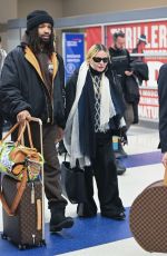 MADONNA and Akeem Morris Arrives at JFK Airport in New York City 01/07/2025