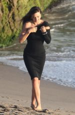 MIRANDA KERR at a Photoshoot on the Beach in Malibu 01/30/2025