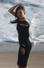 MIRANDA KERR at a Photoshoot on the Beach in Malibu 01/30/2025