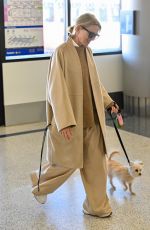 NAOMI WATTS Arrives at Los Angeles International Airport with Her Dog 01/12/2025