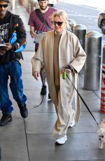 NAOMI WATTS Arrives at Los Angeles International Airport with Her Dog 01/12/2025