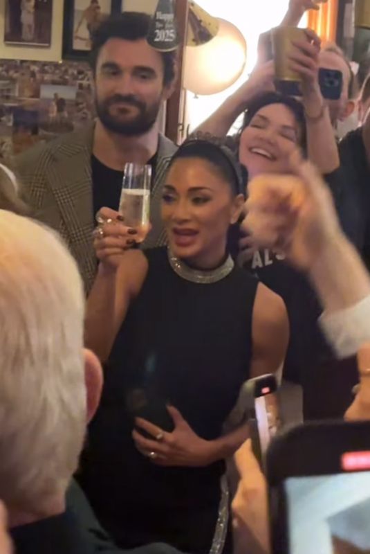 NICOLE SCHERZINGER Welcomed New Year with Her Fiance Thom Evans in New York 01/01/2025