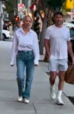 PAMELA ANDERSON and Rumored Boyfriend Shop at Erewhon in Beverly Hills 01/10/2025