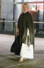 PAMELA ANDERSON Arrives at JFK Airport in New York 01/07/2025