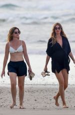 Pregnant GISELE BUNDCHEN Out at a Beach with Her Sisters-in-law in Costa Rica 12/26/2024
