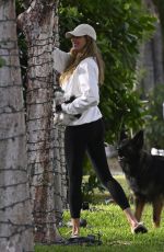 Pregnant GISELE BUNDCHEN Out with Her Dogs in Miami 01/13/2025