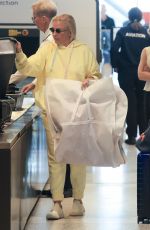 REBEL WILSON and RAMONA AGRUMA Arrives at Sydney Airport 01/12/2025