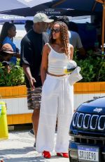 SABRINA DHOWRE and Idris ELBA Arrives at a Beachfront Restaurant in Ipanema 01/02/2025