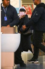 ARIANA GRANDE Arrives at JFK Airport 02/16/2025