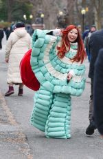 AWKWAFINA on the Set of The Man with the Bag in Central Park in New York 02/20/2025