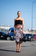 CAROLINE DAUR Arrives at Prada Women