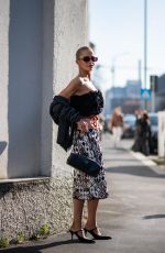 CAROLINE DAUR Arrives at Prada Women