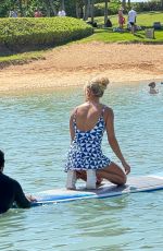 CARRIE UNDERWOOD Paddle Boarding in Hawaii 02/14/2025