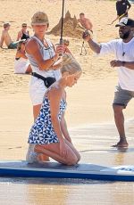CARRIE UNDERWOOD Paddle Boarding in Hawaii 02/14/2025