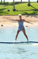 CARRIE UNDERWOOD Paddle Boarding in Hawaii 02/14/2025