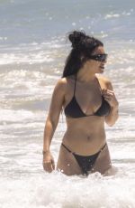 CHARLI XCX in a Black Bikini at a Beach in Byron Bay 02/10/2025