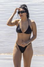 CHARLI XCX in a Black Bikini at a Beach in Byron Bay 02/10/2025
