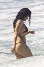 CHARLI XCX in a Black Bikini at a Beach in Byron Bay 02/10/2025