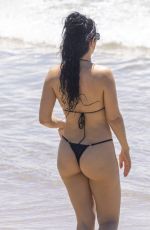 CHARLI XCX in a Black Bikini at a Beach in Byron Bay 02/10/2025