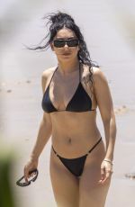 CHARLI XCX in a Black Bikini at a Beach in Byron Bay 02/10/2025
