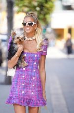 EMMA HERNAN Takes Her Dogs for a Walk Outside Oppenheim Group Office in West Hollywood 02/18/2025