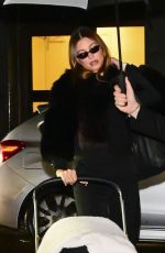 HAILEY BIEBER Out with Baby and Assistant on Rainy City Night 01/31/2025