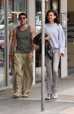 KELLY GALLE Out for Coffee with Mystery Man in Bondi Beach 02/18/2025