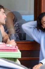 KELLY GALLE Out for Coffee with Mystery Man in Bondi Beach 02/18/2025