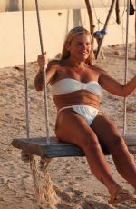 KERRY KATON in Bikini Out at a Beach in Thailand 02/18/2025