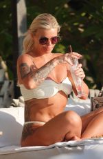 KERRY KATON in Bikini Out at a Beach in Thailand 02/18/2025
