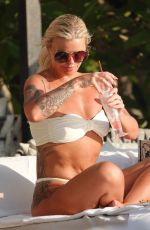 KERRY KATON in Bikini Out at a Beach in Thailand 02/18/2025