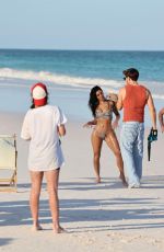 KIM KARDASHIAN in Bikini at a Photoshoot on the Beach in Los Angeles 02/18/2025