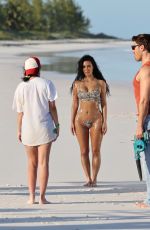 KIM KARDASHIAN in Bikini at a Photoshoot on the Beach in Los Angeles 02/18/2025