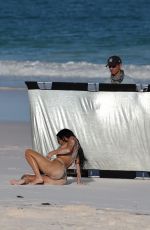 KIM KARDASHIAN in Bikini at a Photoshoot on the Beach in Los Angeles 02/18/2025