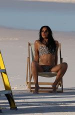 KIM KARDASHIAN in Bikini at a Photoshoot on the Beach in Los Angeles 02/18/2025