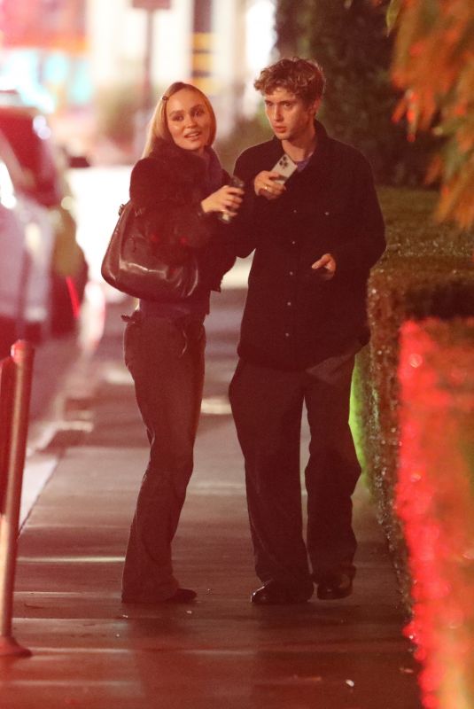 LILY-ROSE DEPP Hugs Troye Sivan After Having Dinner in Los Angeles 02/14/2025
