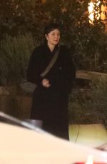 MAGGIE GYLLENHAAL Smoking a Cigarette After Having Dinner with Friends at Madeo Restaurant in West Hollywood 02/01/2025