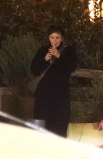 MAGGIE GYLLENHAAL Smoking a Cigarette After Having Dinner with Friends at Madeo Restaurant in West Hollywood 02/01/2025