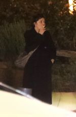 MAGGIE GYLLENHAAL Smoking a Cigarette After Having Dinner with Friends at Madeo Restaurant in West Hollywood 02/01/2025