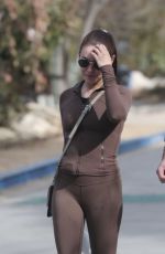 MILA KUNIS Out Hiking with a Friend in Los Angeles 02/03/2025
