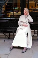 PAMELA ANDERSON in All White Retori Outfit and Vintage Prada Shoes Promotes The Last Showgirl in London 02/17/2025