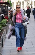 VOGUE WILLIAMS in a Patterned Pink Shirt and Denim Arrives at Global Offices 02/05/2025