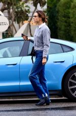 ALESSANDRA AMBROSIO Braves Rain in Denim on Melrose Place 03/12/2025