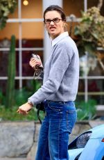 ALESSANDRA AMBROSIO Braves Rain in Denim on Melrose Place 03/12/2025